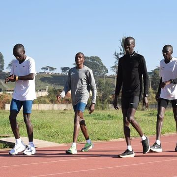 augustine choge during a workout with eliud kipchoge
